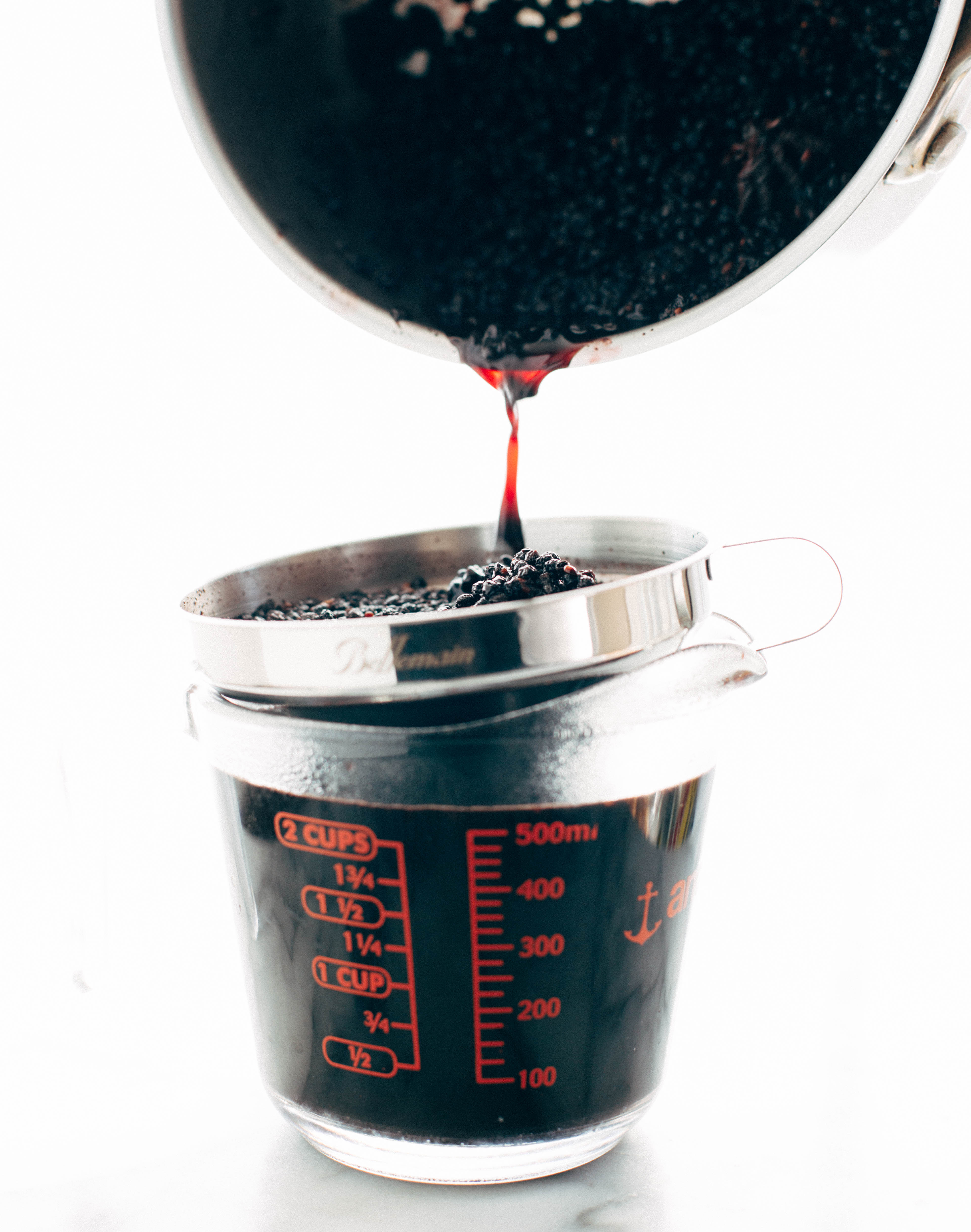 straining elderberry syrup