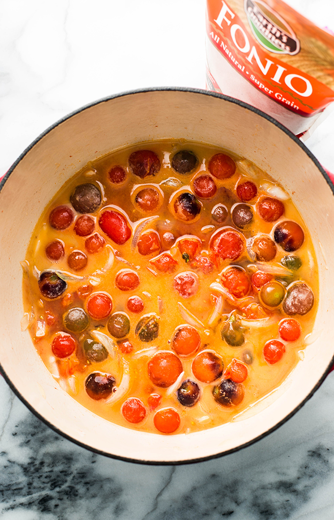 tiny tomatoes stewed in butter with onions