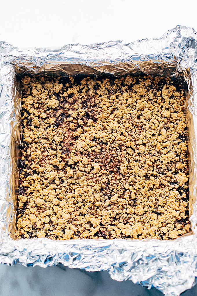 quinoa black plum crumb bars in prepared pan