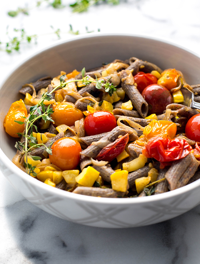 yellow squash and cherry tomatoes with black bean penne - Taste of Yummy