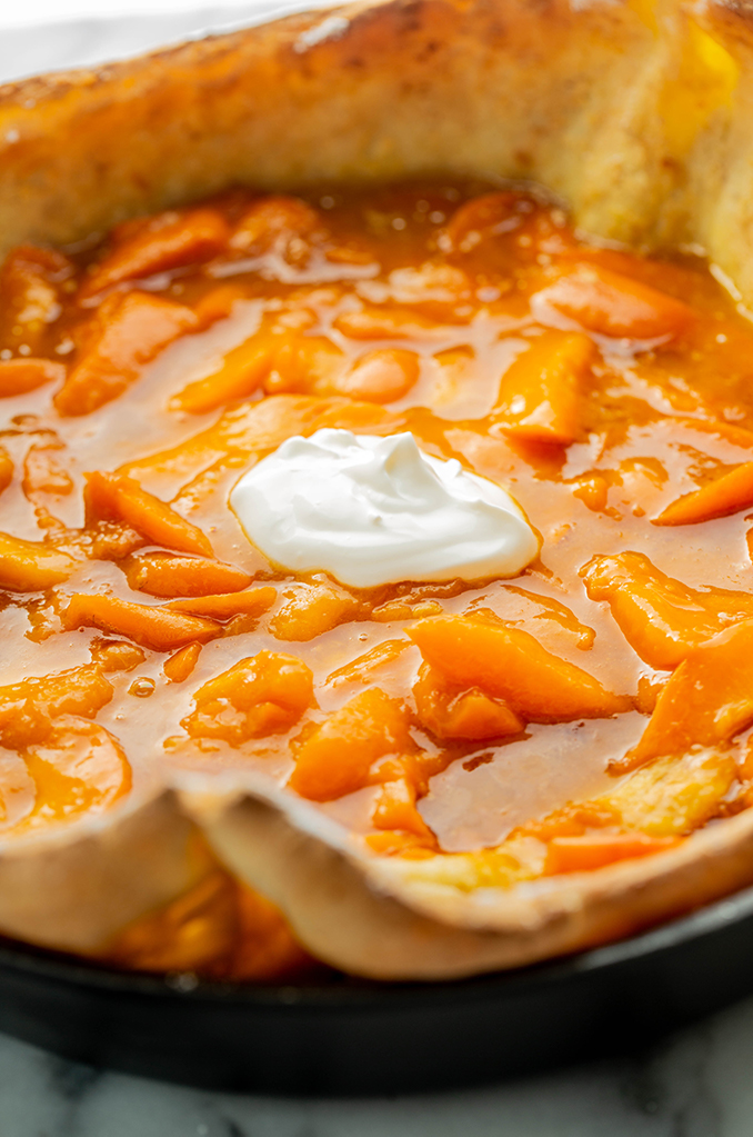 apricot oven pancake with a dollop of sour cream